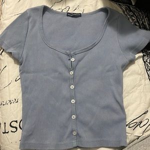 Perfect condition Brandy Melville blue button top. It’s ribbed as well.